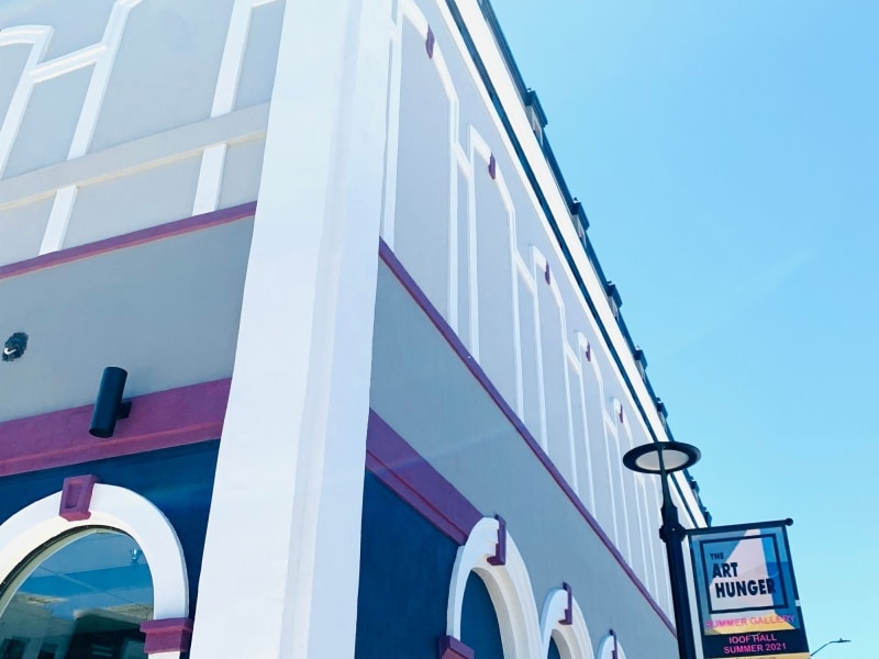 The Independent Order of Odd Fellows or IOOF building was purchased by the McConnell Foundation in 2018. Newly restored stucco covers the original brick. The building was built in 1888. Photo by Annelise Pierce.