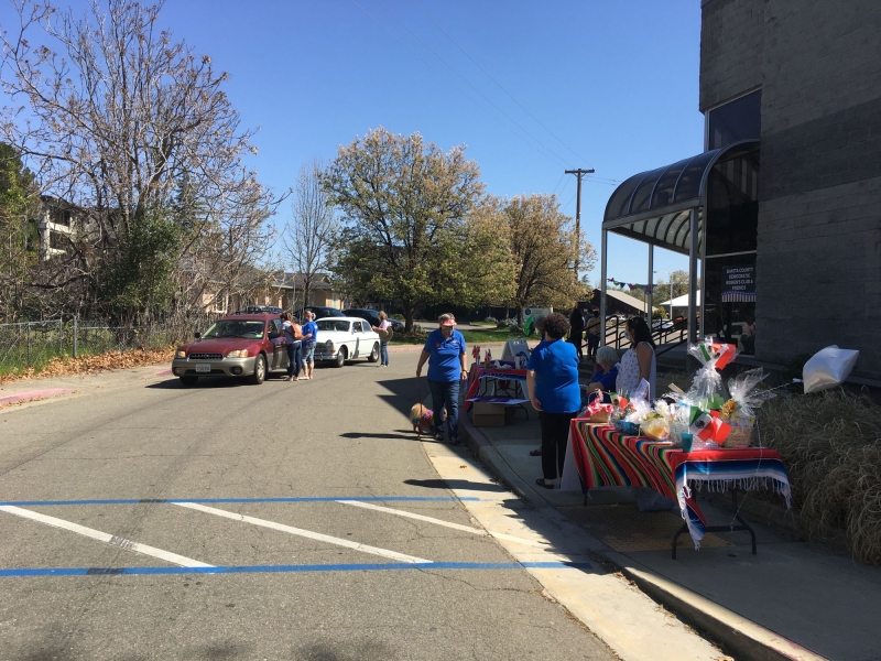 A huge rendition of The Art Hunger Logo hangs in the hallway of the IOOF hall. Valezquez declined to allow pictures of the gallery set-up in progress. "We want people to experience the big surprise," he said. Photo by Annelise Pierce.