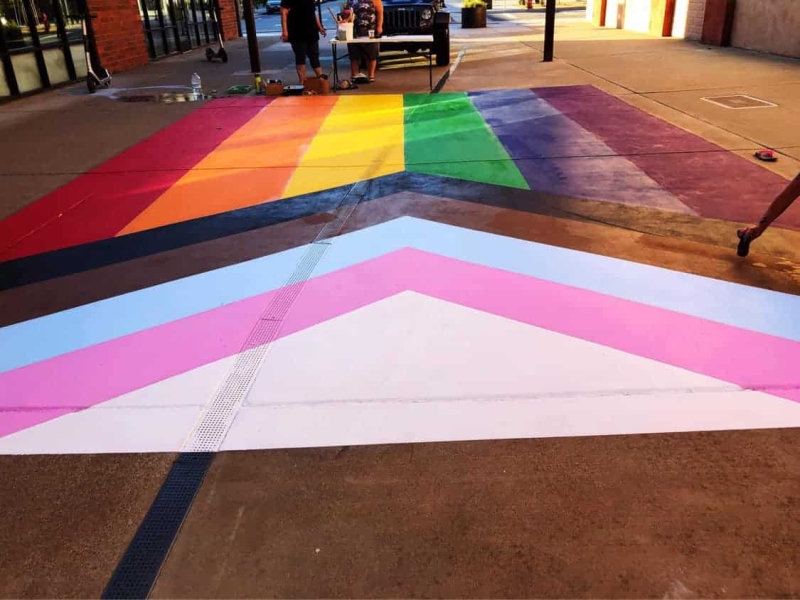 The intersectional Pride flag was painted under the umbrellas in downtown Redding. Photo courtesy, Wolfpack Clubhouse.