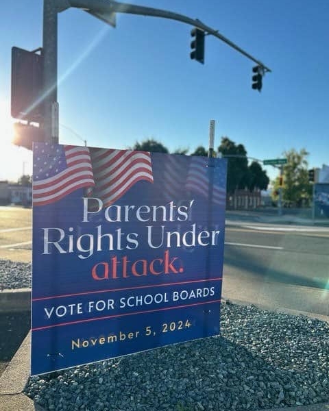 Campaign sign that reads "Parents' Rights Under attack," urging people to vote in the school board election on November 5. Photo by Annelise Pierce.